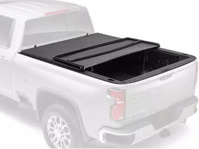Alaska hard folding tonneau cover on a truck bed in snow